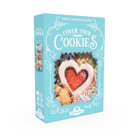 Cover Your Cookies - A turquoise rectangular box with white decorative text reading "Cover Your Cookies," featuring a heart-shaped cookie with.