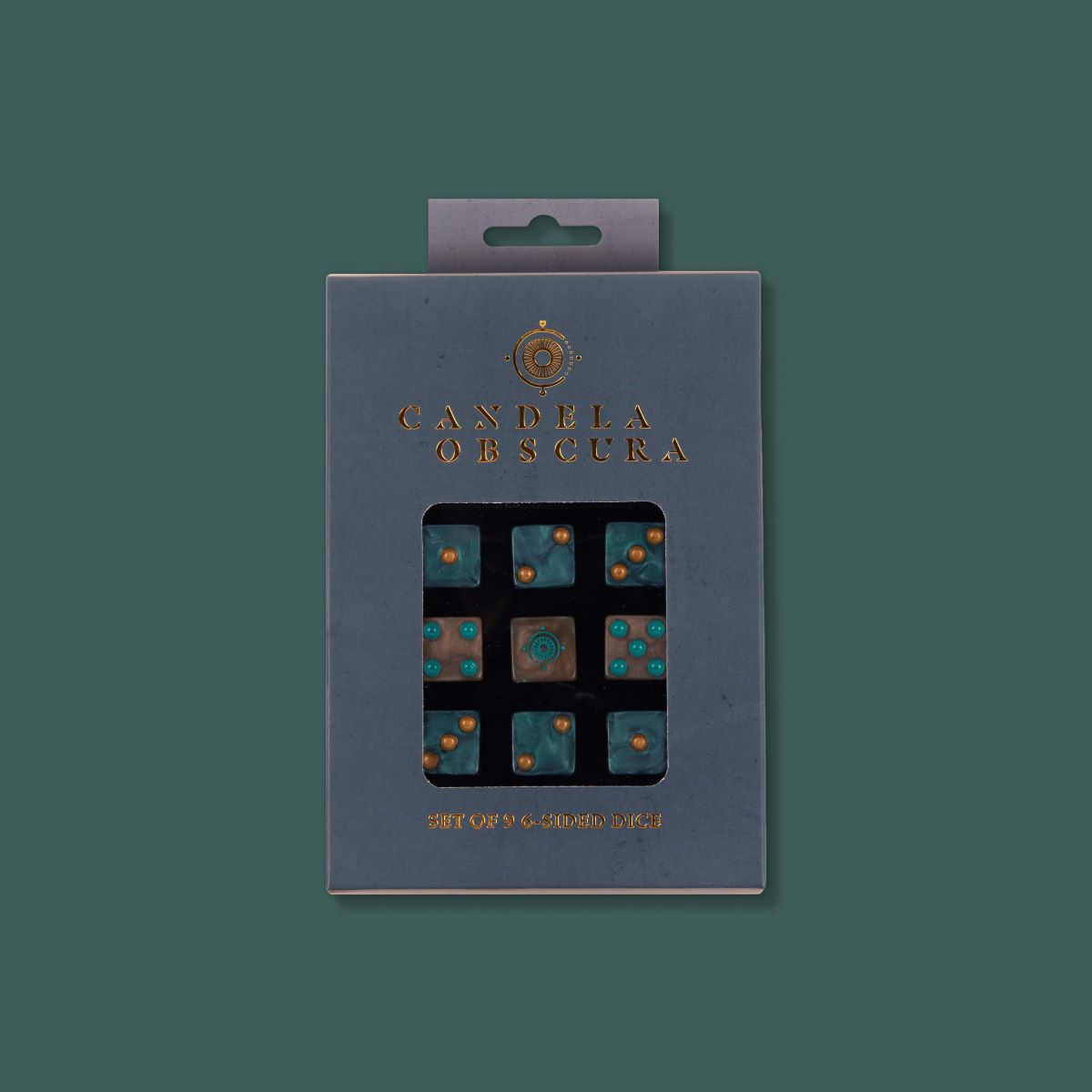 Candela Obscura Official Dice Set - Black polyhedral dice set with turquoise and gold speckled detailing, displayed in dark blue packaging with gold lettering.