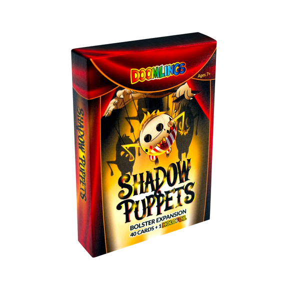 Doomlings: Shadow Puppets Bolster Expansion (PREORDER) - Doomlings Shadow Puppets Bolster Expansion box with red curtains and puppet character on black and yellow background.