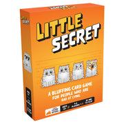 Little Secret - Orange rectangular box with bold yellow and white text "Little Secret" and four illustrated cats below, packaging for a.