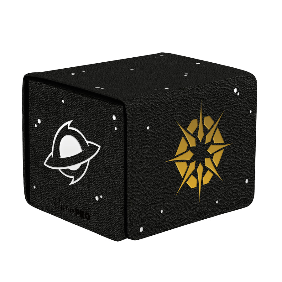 Ultra Pro Alcove Edge 100+: Magic the Gathering: Edge of Eternities - Adagia, Windswept Bastion - Black cube-shaped deck box with small white star-like speckles, gold stylized sun emblem on one side, white planet ring icon
