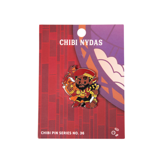 Critical Role Chibi Pin - Nydas Okiro - Chibi-style enamel pin of a dark-skinned character with red and gold armor holding a curved blade, on a red and purple.