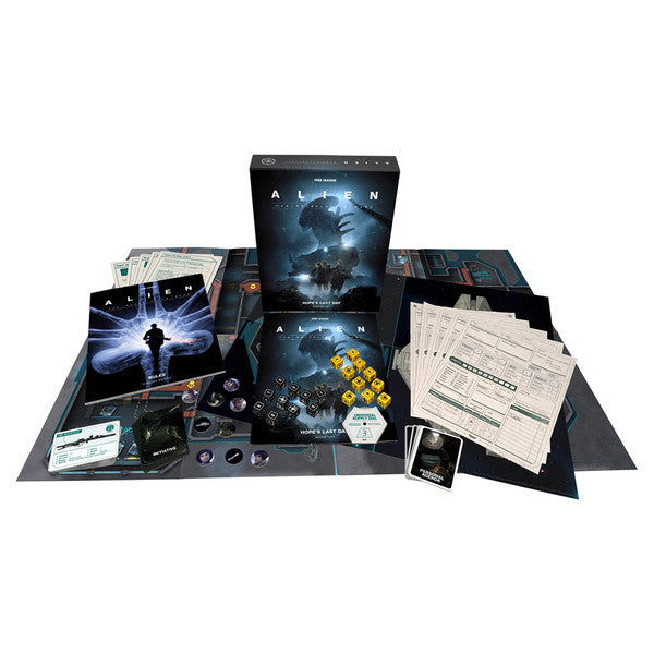 ALIEN RPG: Evolved Edition: Starter Set - Evolved Edition Starter Set with black box, game board, yellow dice, cards, and rulebook sheets spread out.