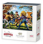 Boardwalk 500 Piece Puzzle: Fall Football - 500-piece jigsaw puzzle with vibrant autumn football scene featuring children playing outdoors in colorful fall clothing.