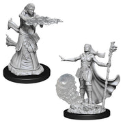 D&D Nolzur's Marvelous Miniatures: Female Human Wizard - Unpainted gray resin miniatures of a female human wizard casting a fire spell and a male wizard with a staff and flowing.