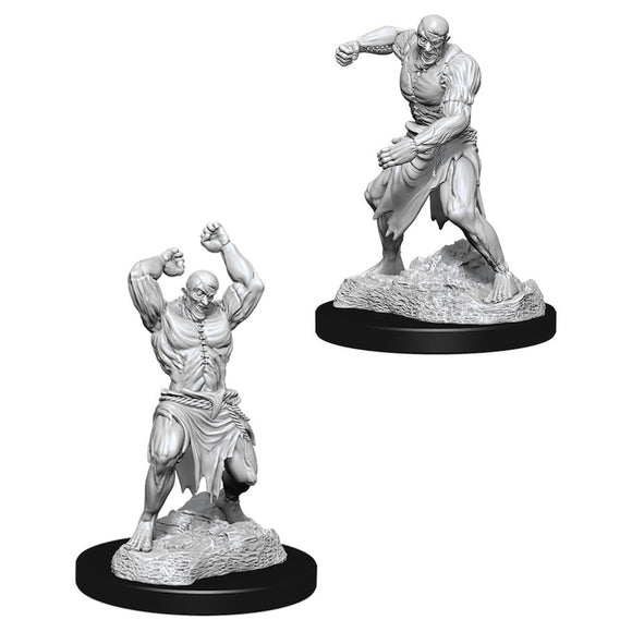 D&D Nolzur's Marvelous Miniatures: Flesh Golem - Gray plastic miniature of a muscular humanoid flesh golem with stitched body, posed ready to attack on a round black base.
