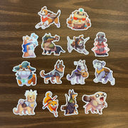 D&D Dogs Sticker Pack - Colorful cartoon dog stickers dressed as fantasy D&D characters with various costumes and accessories on a wooden surface.