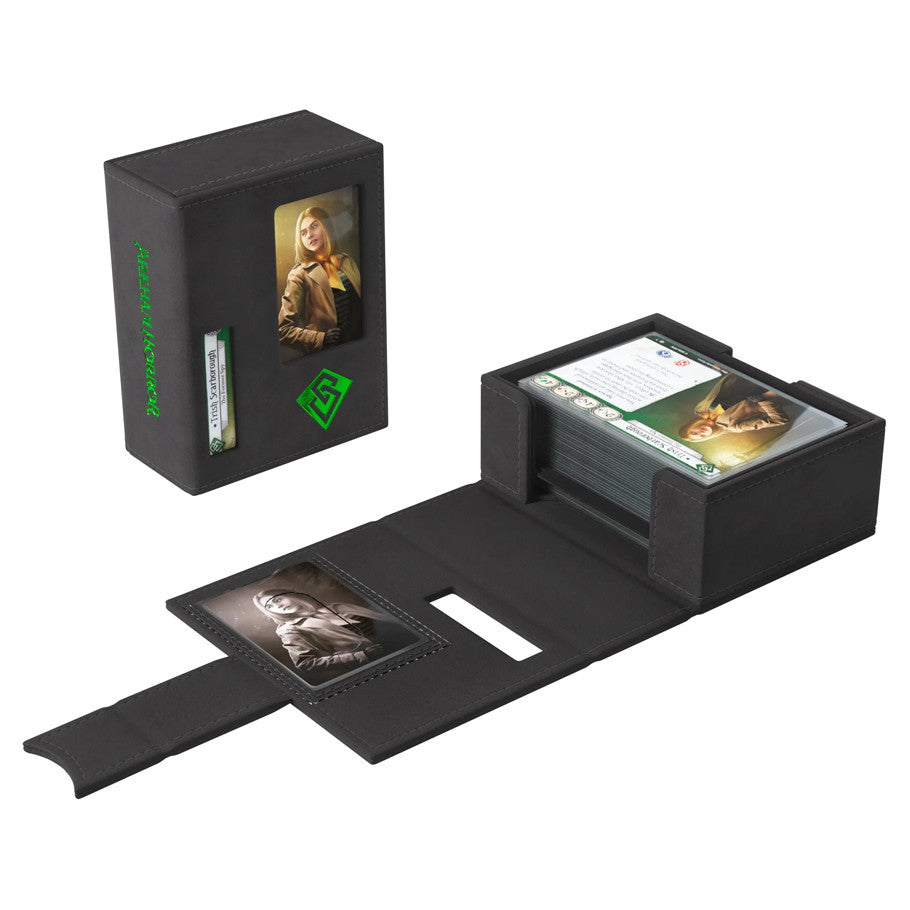 GameGenic Deck Tome: Arkham Horror: Green (PREORDER) - Black rectangular deck box with green "Arkham Horror" text, containing cards and dividers featuring fantasy-themed artwork.