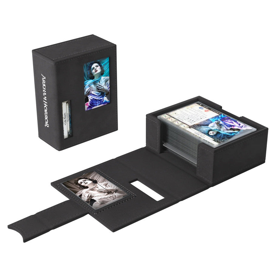 GameGenic Arkham Horror Deck Tome: Gray (PREORDER) - Black rectangular deck box with gray lining, holding Arkham Horror-themed cards and featuring character artwork on the top.