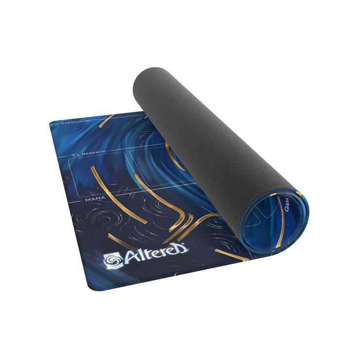 Gamegenic Prime Playmat: Altered - The Crow's Eye - Dark blue gaming playmat with swirling patterns, crescent shapes, and Altered logo, partially rolled up.