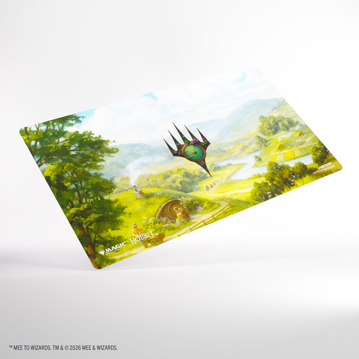 Gamegenic- Magic: The Gathering | The Hobbit Prime Playmat - The Shire - Rectangular playmat with vibrant green and yellow countryside landscape featuring a Hobbit hole and floating fantasy emblem.