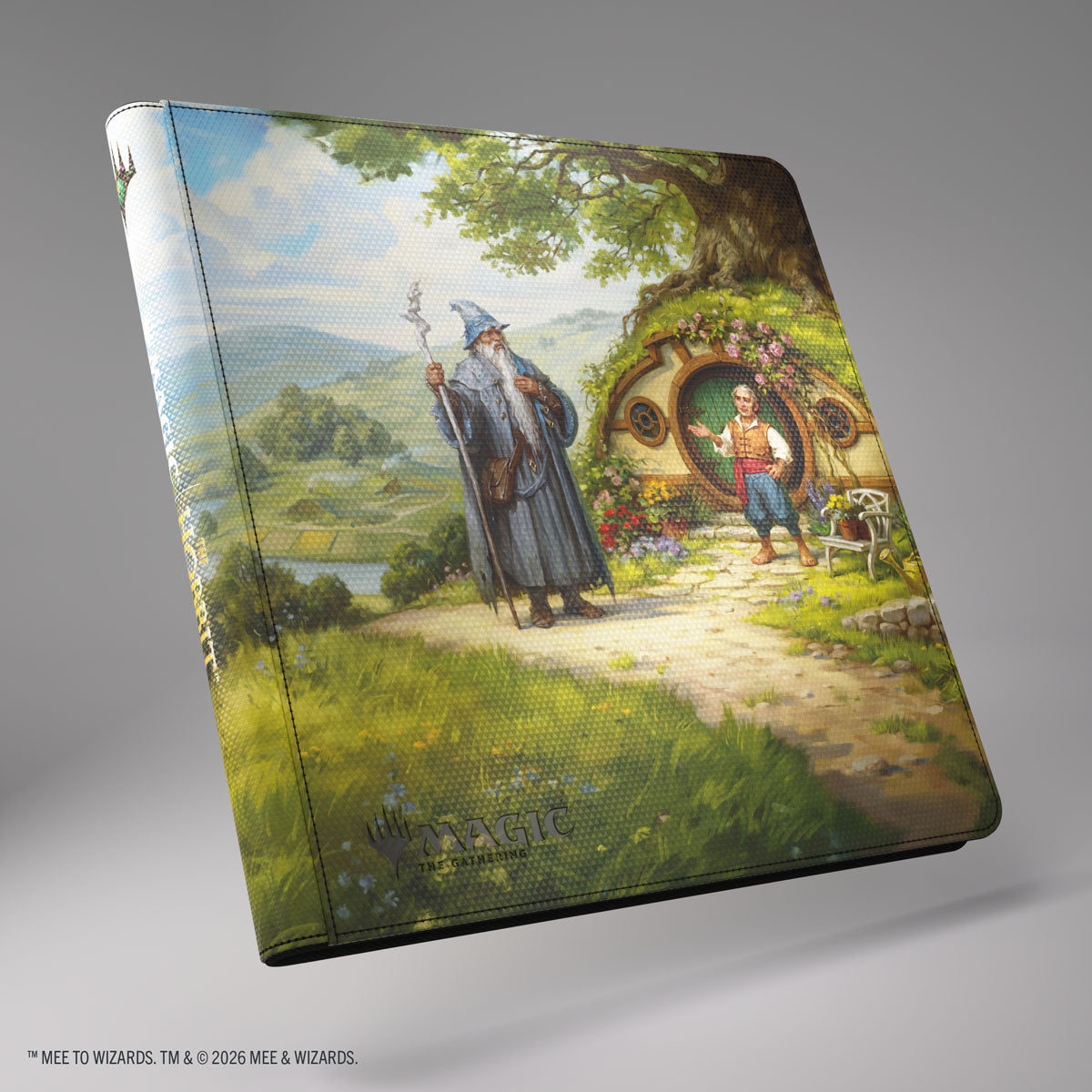 Gamegenic- Magic: The Gathering | The Hobbit Zip-Up Album 24-Pocket - The Shire - Zip-up card binder with illustrated Hobbit Shire scene, featuring Gandalf and Bilbo at a hobbit hole, vibrant colors.