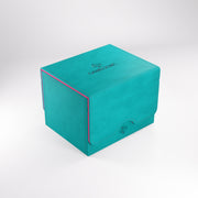 Gamegenic: Sidekick 100+ XL - Teal/Pink - Teal rectangular deck box with pink edges and a flap closure, smooth textured surface, Gamegenic logo on top.
