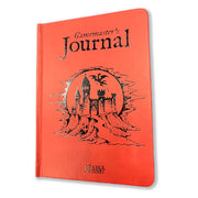 RPG Gamemaster's Journal - Orange softcover journal with black fantasy castle illustration and "Gamemaster's Journal" text on front cover.
