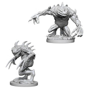 D&D Nolzur's Marvelous Miniatures: Grey Slaad & Death Slaad - Two unpainted Dungeons & Dragons miniatures, one crouching with long claws and spiked back, the other standing with muscular