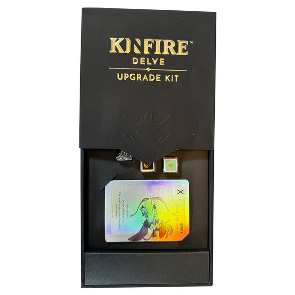 Kinfire Delve Upgrade Kit - Black rectangular box with gold "Kinfire Delve Upgrade Kit" text, containing a set of colorful, holographic game cards with.