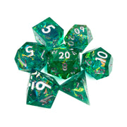 Blessed Beacon Dice Set - Translucent green polyhedral dice set with gold metallic flakes and white numbers, includes d4, d6, d8, d10, d12, and d20.