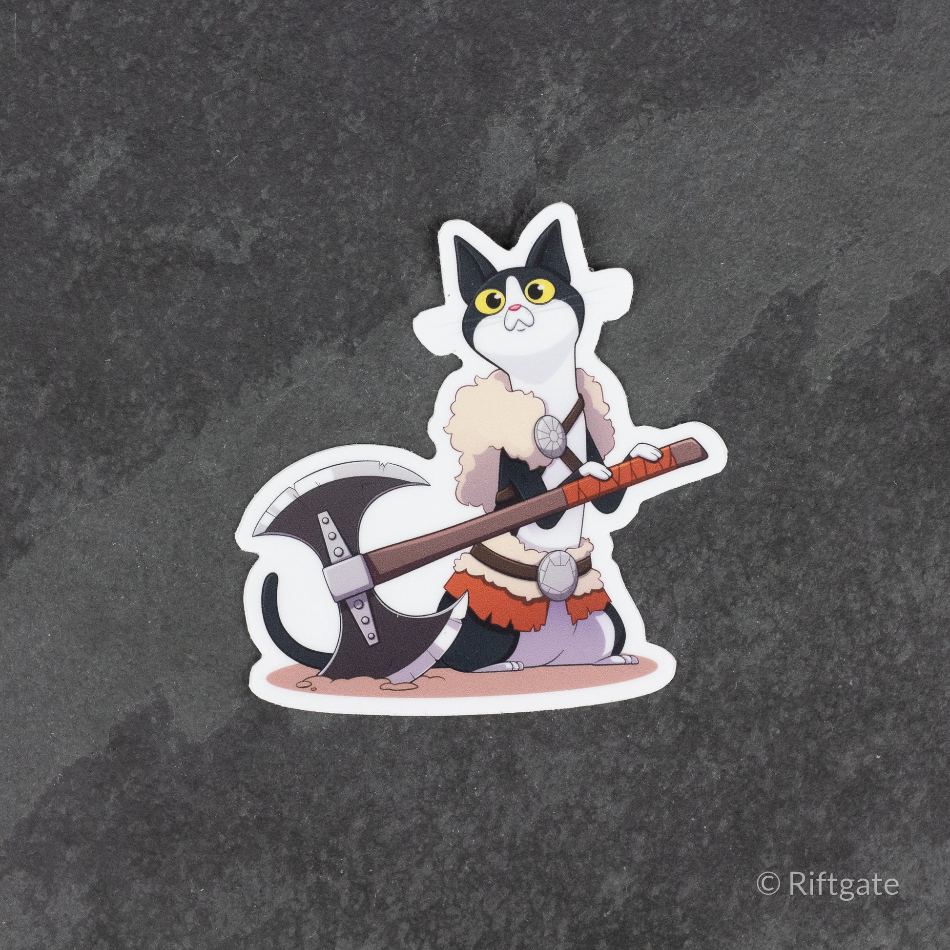 Barbarian Class D&D Cat Sticker - Sticker of a black and white cat dressed as a barbarian holding a large battle axe.