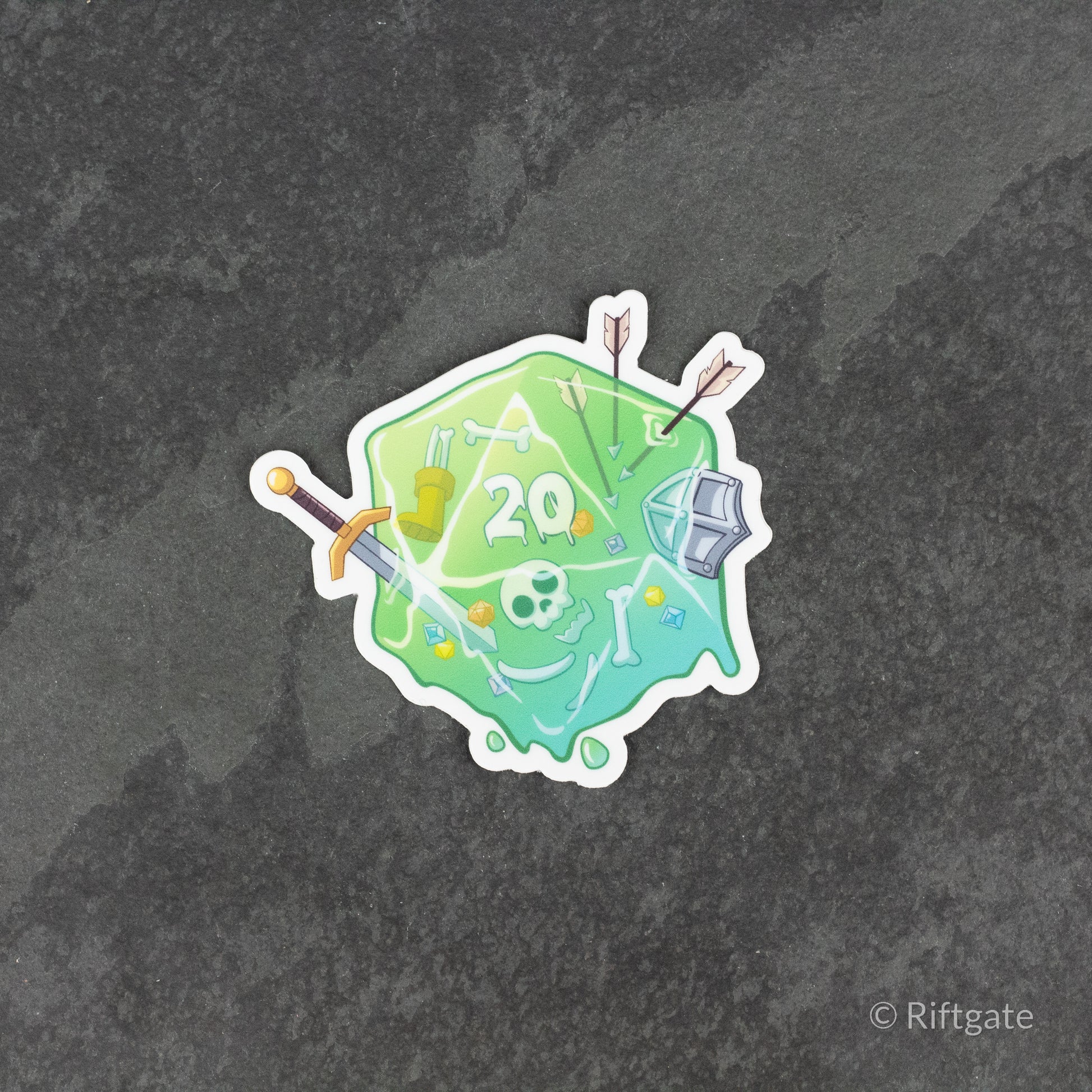Gelatinous D20 DnD Sticker - Green gelatinous d20 dice with fantasy weapons and skull details sticker.