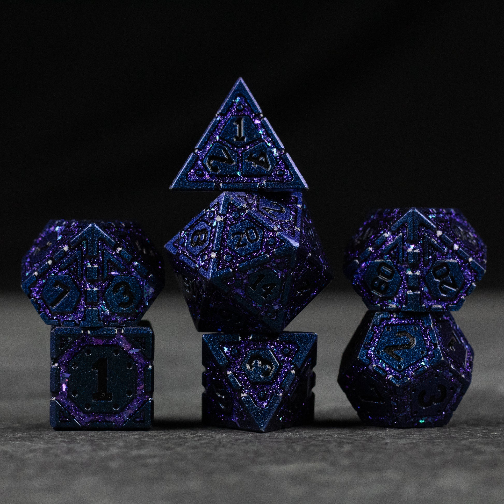 Purple Superior Ward Metal Dice Set - Set of six purple metal polyhedral dice with engraved numbers and intricate geometric patterns, including d4, d6, d8, d10,.