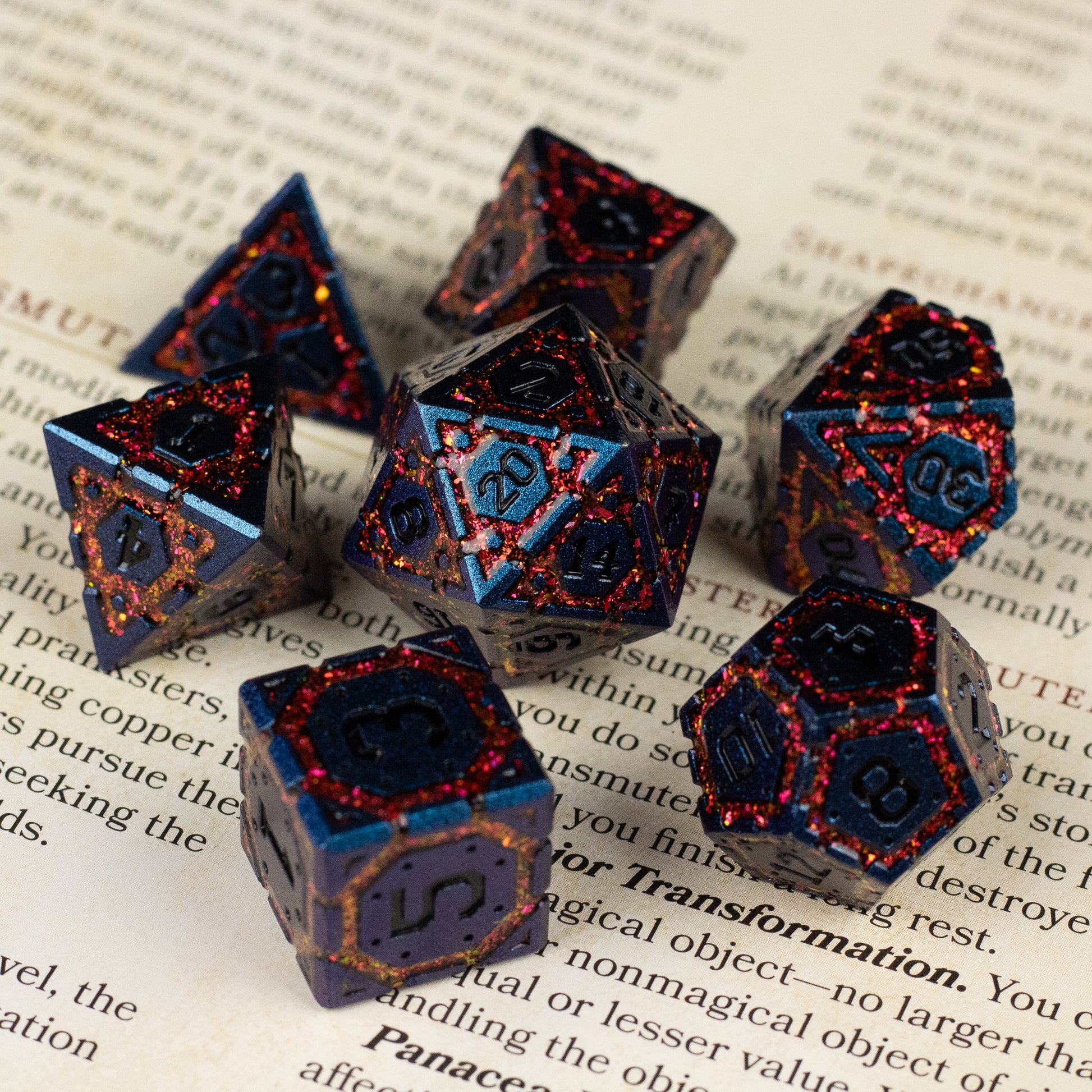 Red Superior Ward Metal Dice Set - Set of eight red and black metal polyhedral dice with etched numbers, featuring a glossy finish and intricate color pattern.
