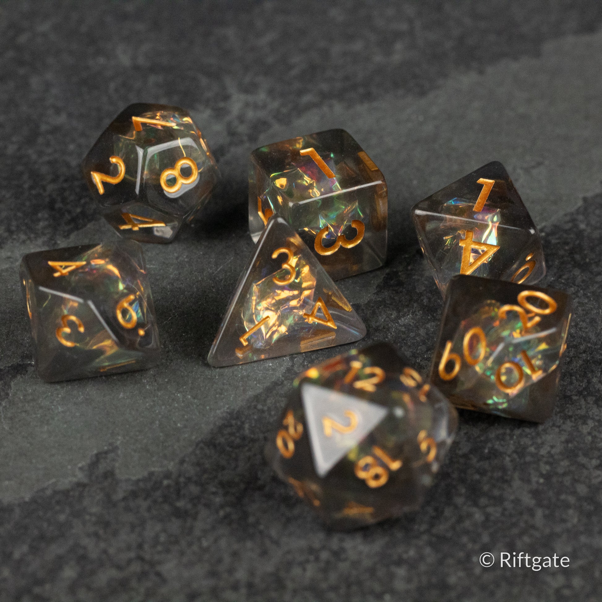 Dark Star Dice Set - Black translucent polyhedral dice set with glowing orange numbers, including d20, d12, d10, d8, d6, d4, and percentile dice.