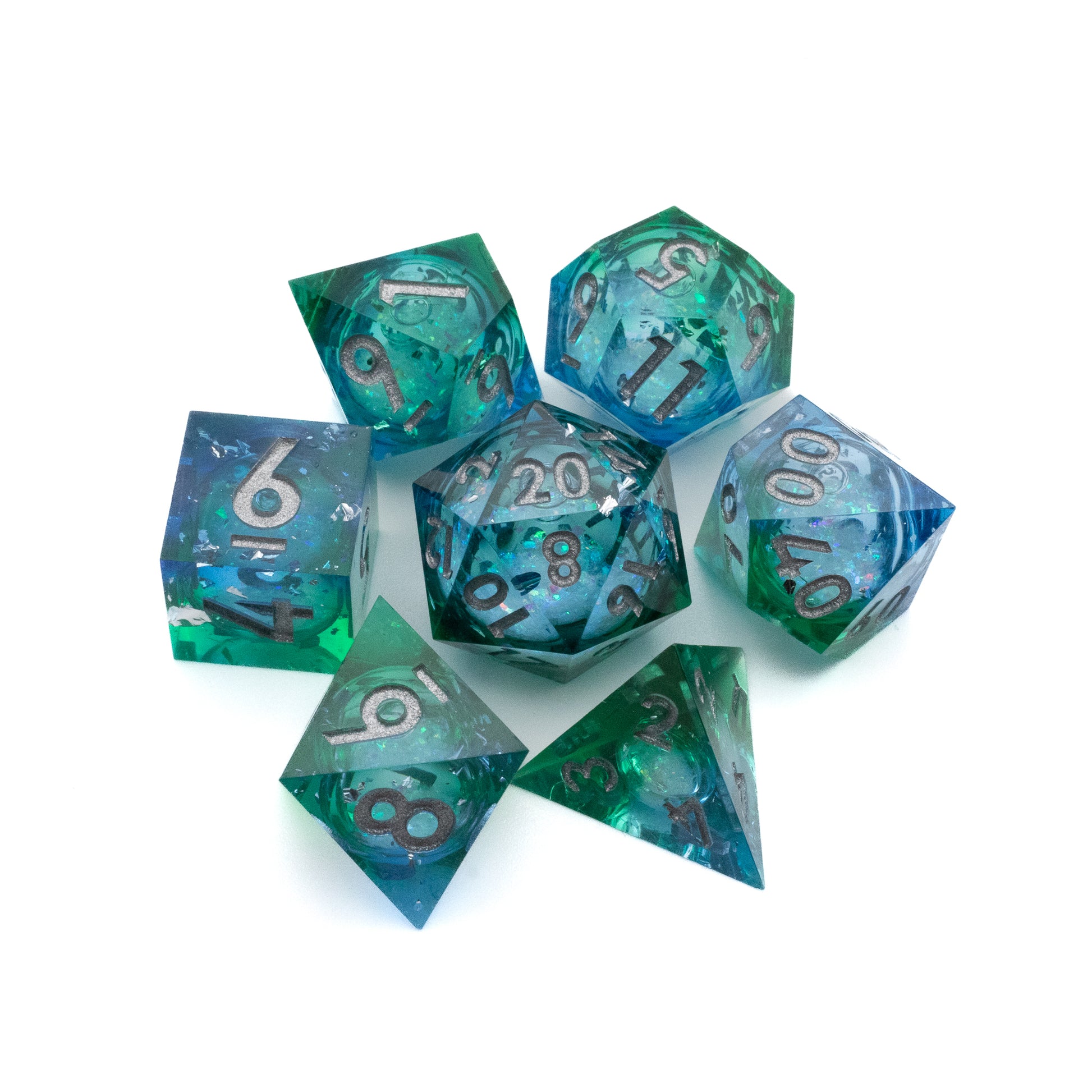 Triton's Treasure Liquid Core Dice Set - Seven translucent polyhedral dice with a swirling green and blue liquid core and white numbering.