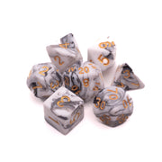 White & Gray Opaque Swirled Dice - Set of seven polyhedral dice with white and gray opaque swirling patterns and gold numbers.