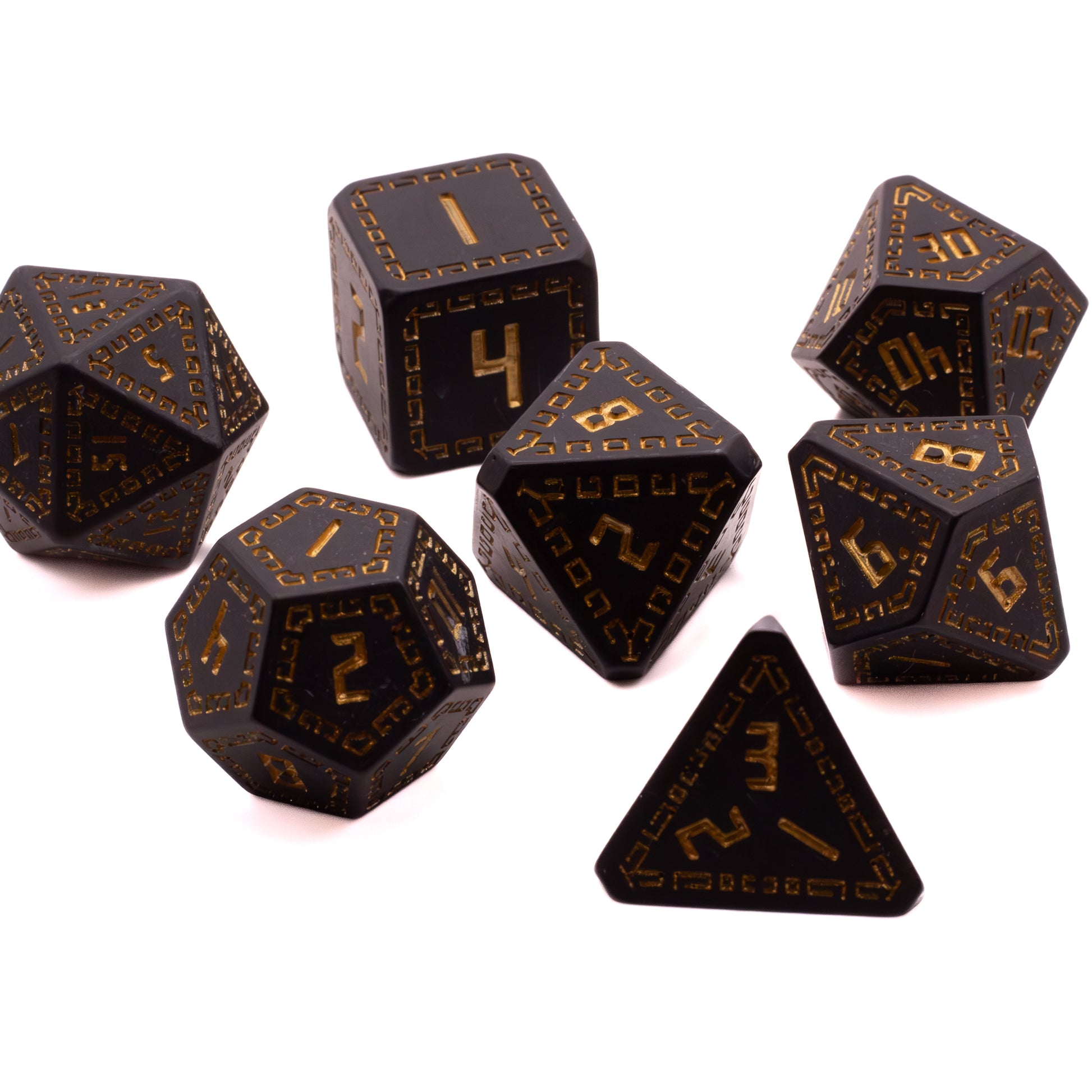Black Knight Runes Dice Set - Black polyhedral dice set with gold rune-style numbers and symbols, featuring dice of various shapes including d20, d12,.