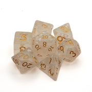 White Stars & Glitter Dice Set - Translucent white polyhedral dice set with gold numbering and embedded glitter stars.