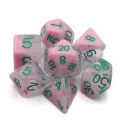 Pink Fog Cloud Dice Set - Seven pink polyhedral dice with green numbers, featuring a marbled foggy pattern and various shapes for tabletop gaming.