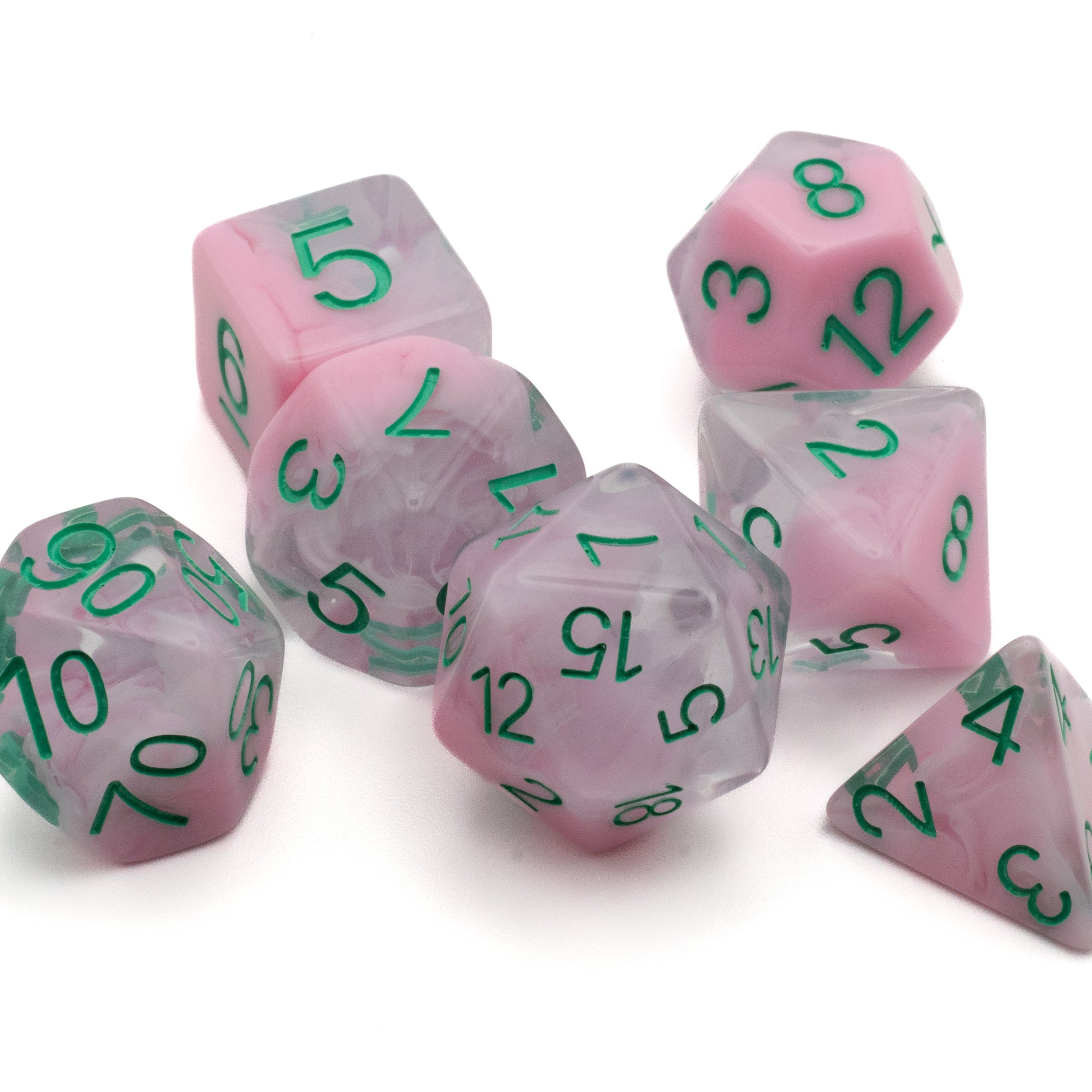 Pink Fog Cloud Dice Set - Translucent pink polyhedral dice with swirling fog patterns and green numbers, including d4, d6, d8, d10, d12, and d20.