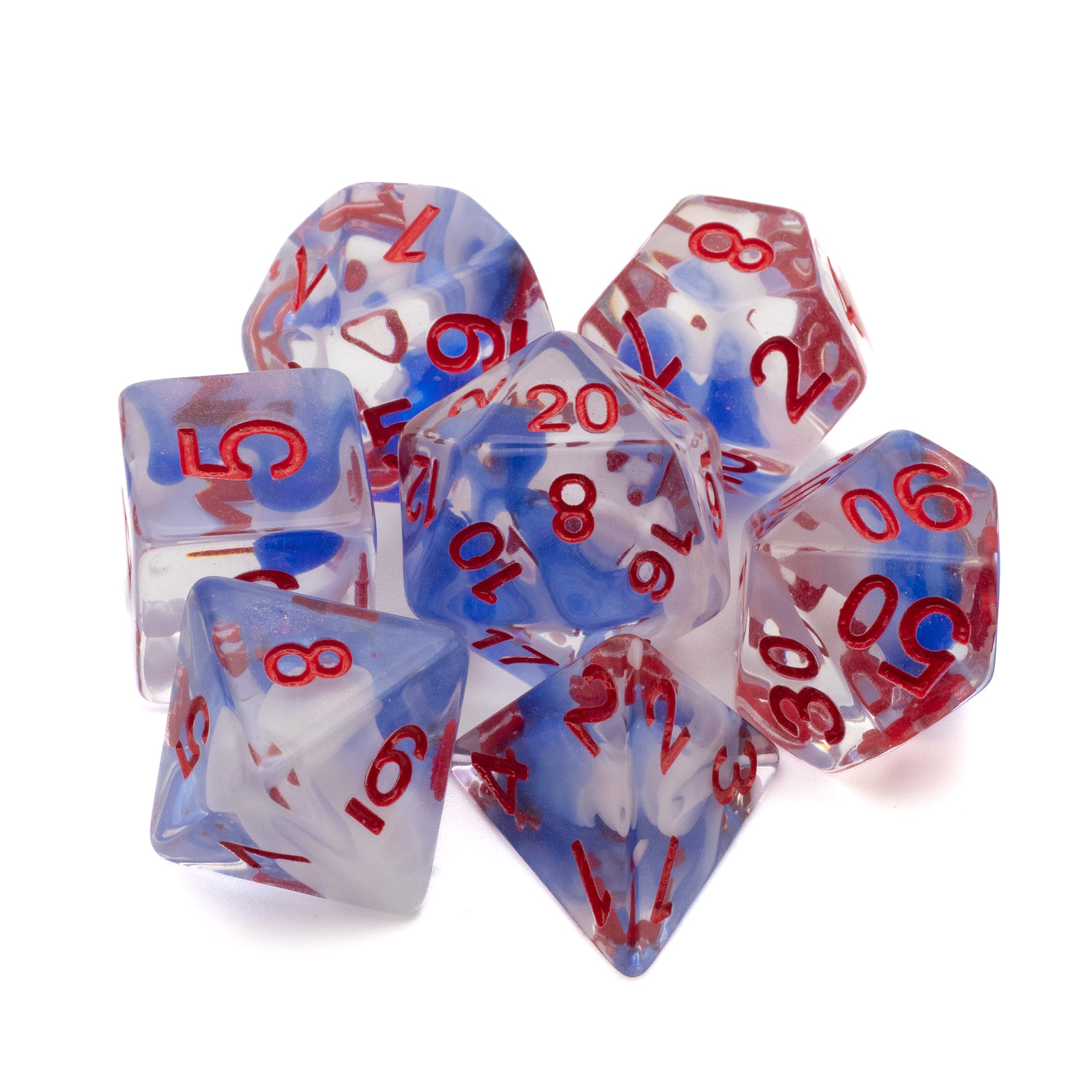 White & Blue Arcane Ooze Dice Set - White and blue swirled polyhedral dice set with red numbering, including d20, d12, d10, d8, d6, and d4 shapes.