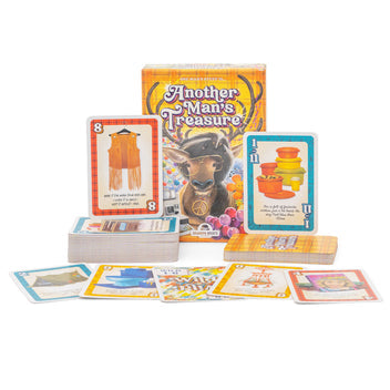 Another Man's Treasure - Card game box titled Another Man's Treasure with illustrated cards featuring colorful objects and numbers laid out in front.