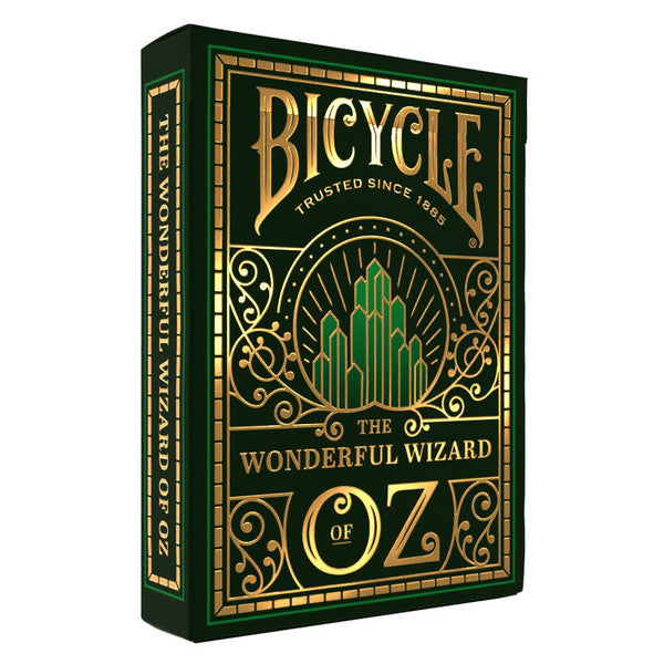 Bicycle Playing Cards: Wizard of Oz - Dark green Bicycle playing cards box featuring gold ornate designs and the Emerald City illustration, themed The Wonderful.