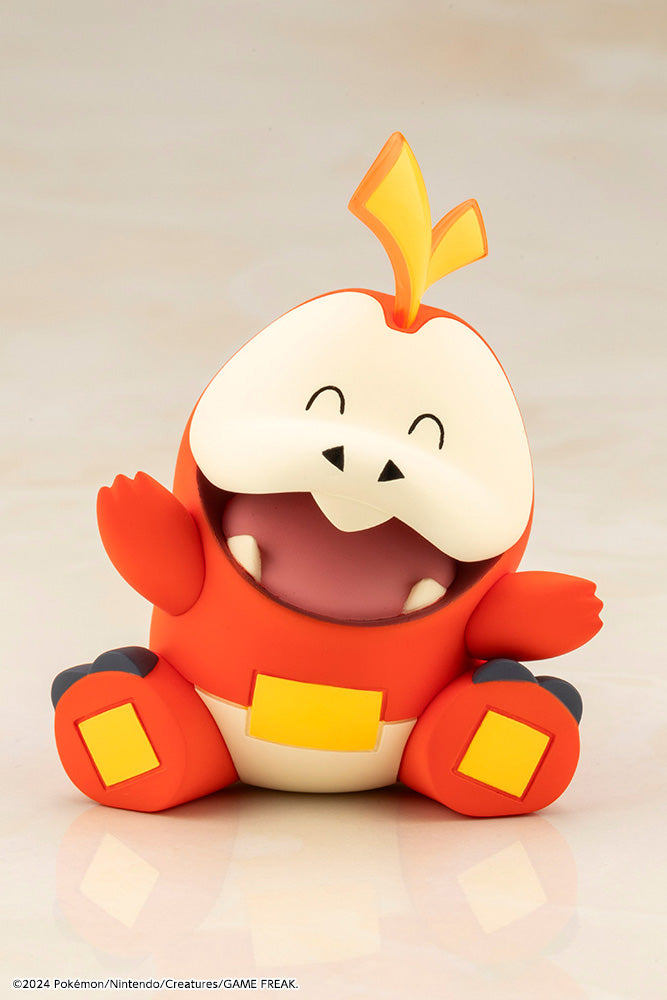 Pokemon Florian with Fuecoco ARTFX J STATUE - Red and cream cartoon creature statue with big mouth and yellow flame-shaped crest on head.