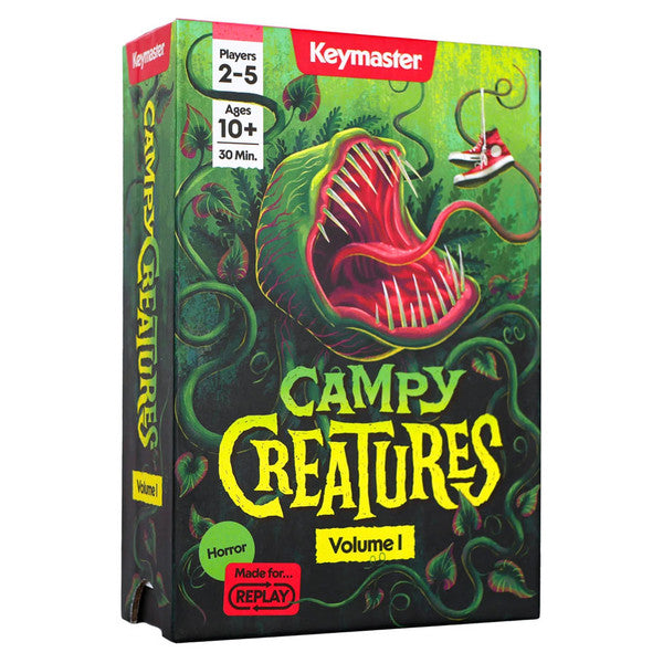 Campy Creatures Volume 1 (3rd Edition) - Campy Creatures Volume 1 card game box with green and dark swirling background and a red carnivorous plant illustration.