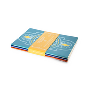 Critical Role Libraries of Exandria Notebooks 3-Pack - Three flat notebooks in blue, orange, and red with geometric feather designs, wrapped with a yellow band.
