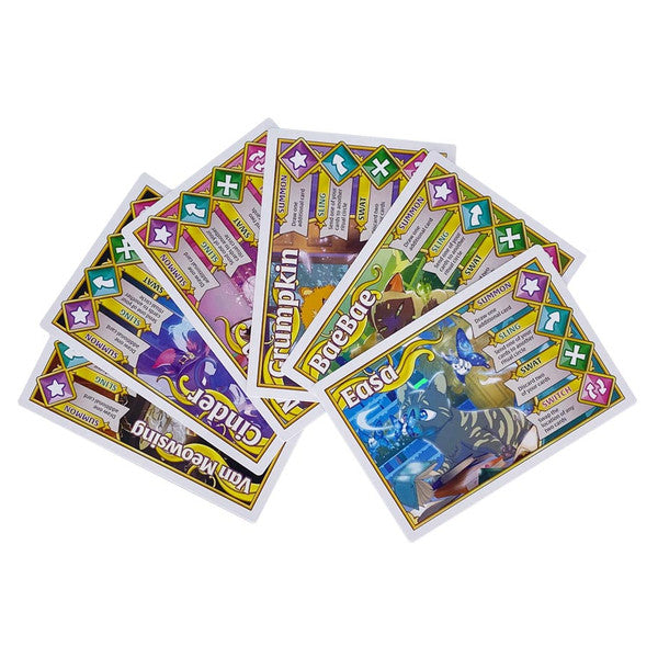 Wizard Kittens: Library Edition - Colorful rectangular game cards fanned out showing cartoon kittens and fantasy-themed icons.