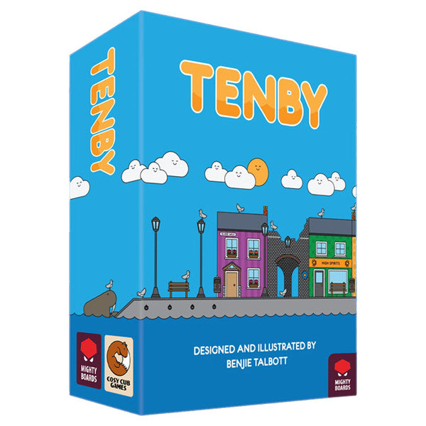 Tenby - Bright blue box featuring colorful illustrated town buildings, street lamps, clouds, and a bird, labeled Tenby.