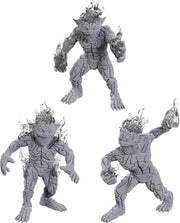 D&D Nolzur's Marvelous Miniatures: Magmins - Three unpainted gray resin miniatures depicting fiery, humanoid Magmin creatures with textured, molten rock-like skin and.