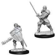 D&D Nolzur's Marvelous Miniatures: Male Human Fighter - Two unpainted gray plastic miniatures of male human fighters, one wielding a sword and shield with a flaming mace, the other