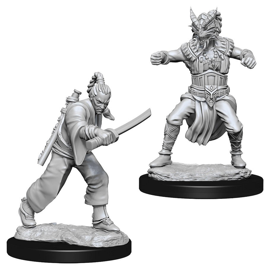 D&D Nolzur's Marvelous Miniatures: Male Human Monk - Two gray plastic miniatures of a male human monk in dynamic martial arts poses, detailed with armor, robes, and a katana on.