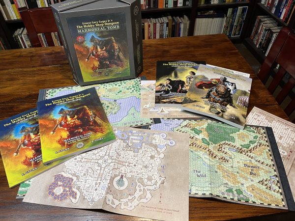 The Marmoreal Tomb Campaign Starter Box Set (PREORDER) - Box set featuring fantasy artwork on cover, includes two colorful booklets, detailed map sheets, and a fold-out campaign.