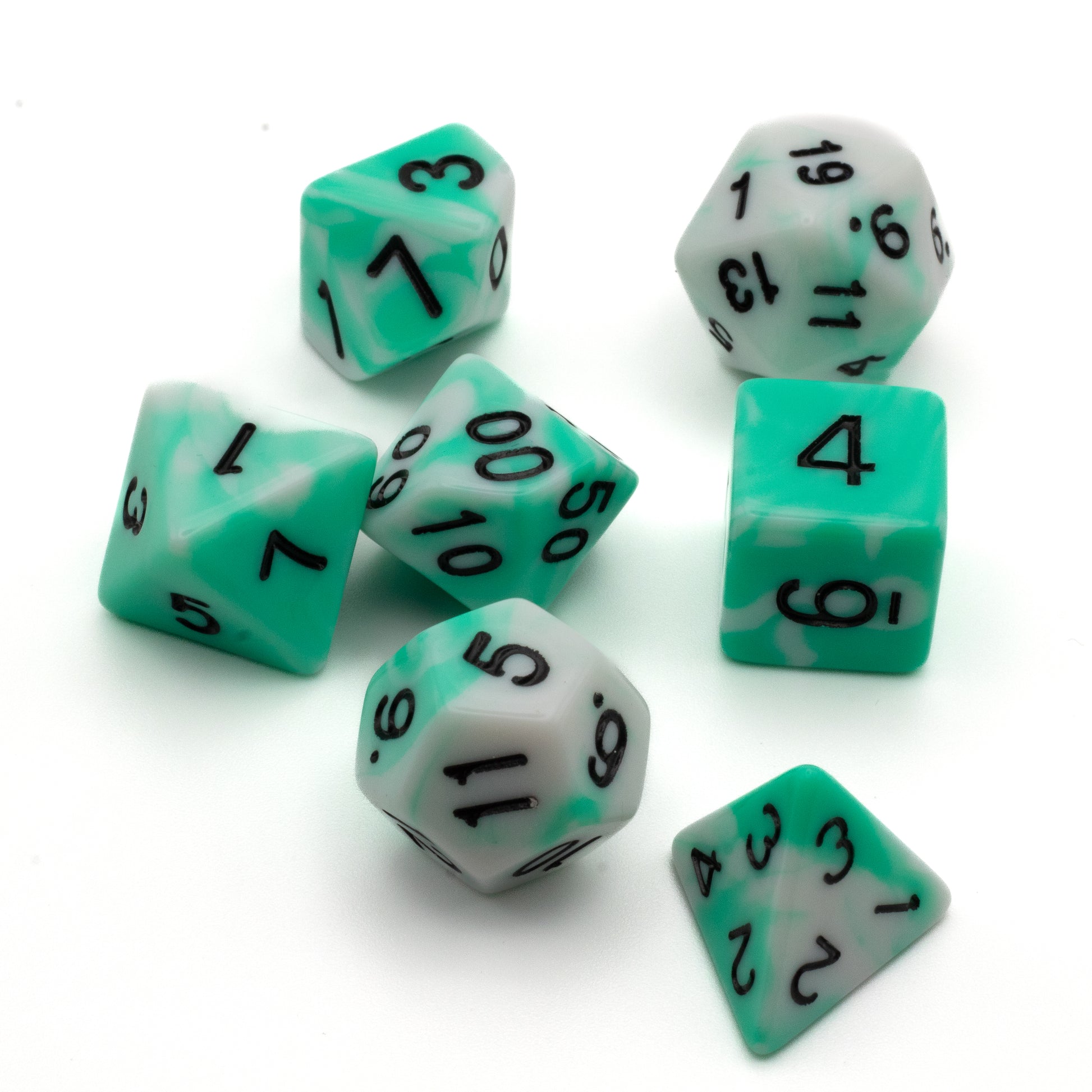 Mint and White Marbled Dice Set - Seven acrylic dice featuring a mint green and white marbled pattern with black numbers.