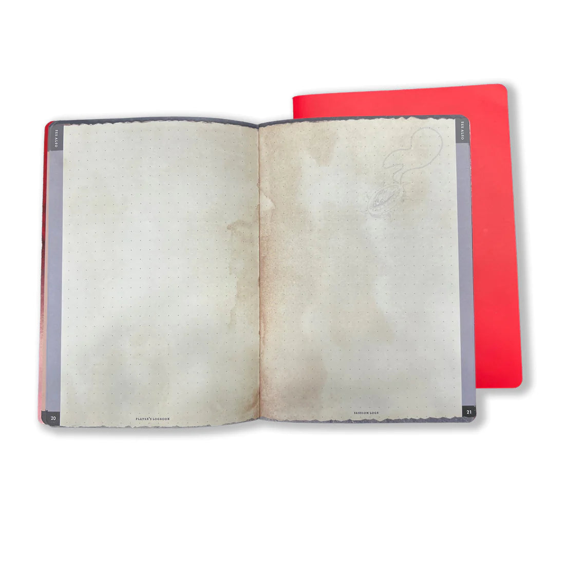 RPG Player's Logbooks - Open RPG player’s logbook with blank, aged parchment-style pages and black decorative corners, red cover visible beneath.