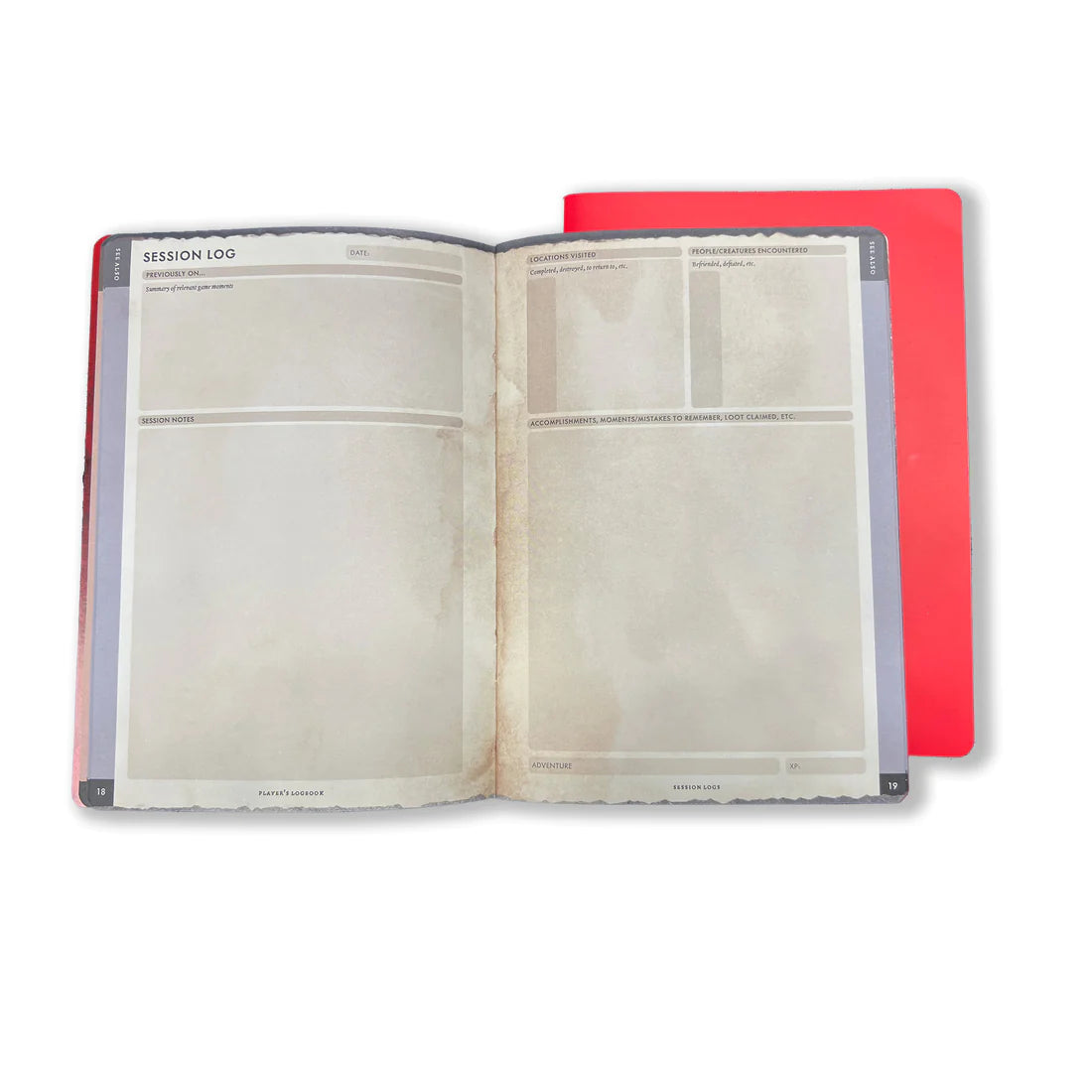 RPG Player's Logbooks - Open RPG player’s logbook with beige pages featuring structured lines and boxes for character information, lying next to a.