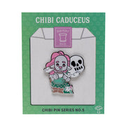Critical Role Chibi Pin - Caduceus Clay - Chibi enamel pin of a pink-haired character holding a skull with a green outfit on a green backing card.