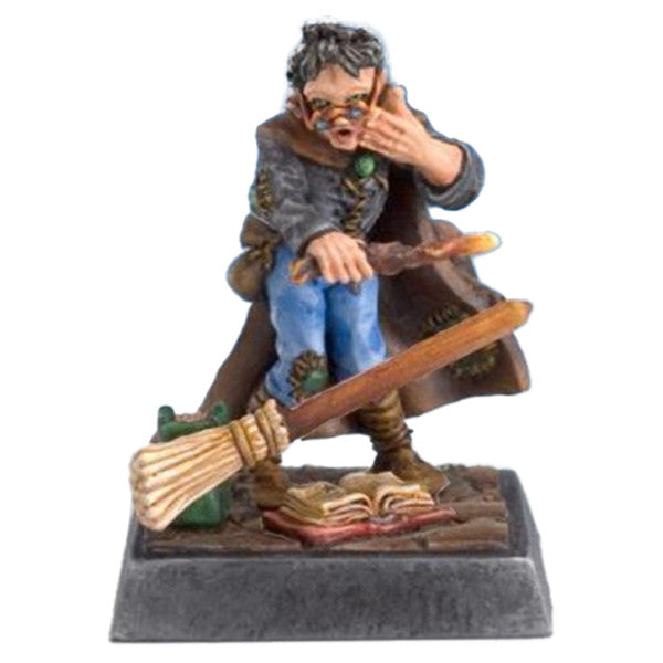 Wizard's Apprentice (Unpainted) - Unpainted resin miniature of a young wizard apprentice with glasses, seated on a stone base, holding a broomstick over an.