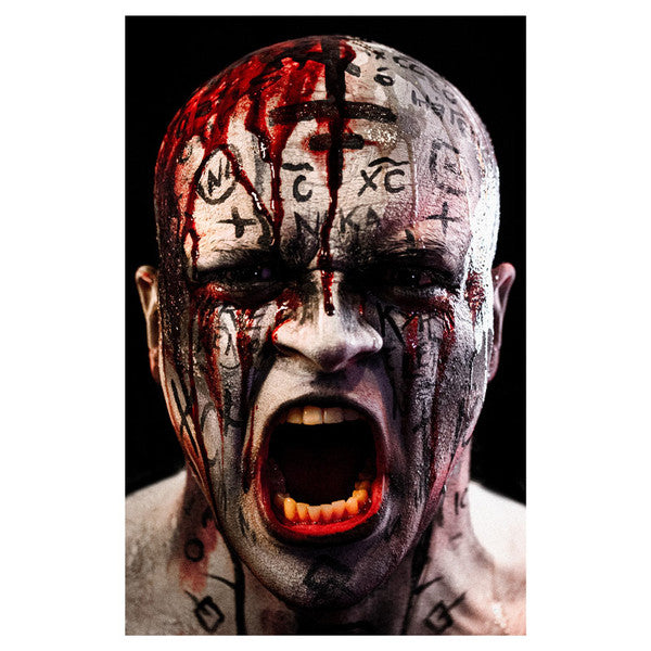 Mork Borg: Empire of Hatred - Head covered in white paint with black cryptic symbols and red blood streaks, mouth open in a scream.